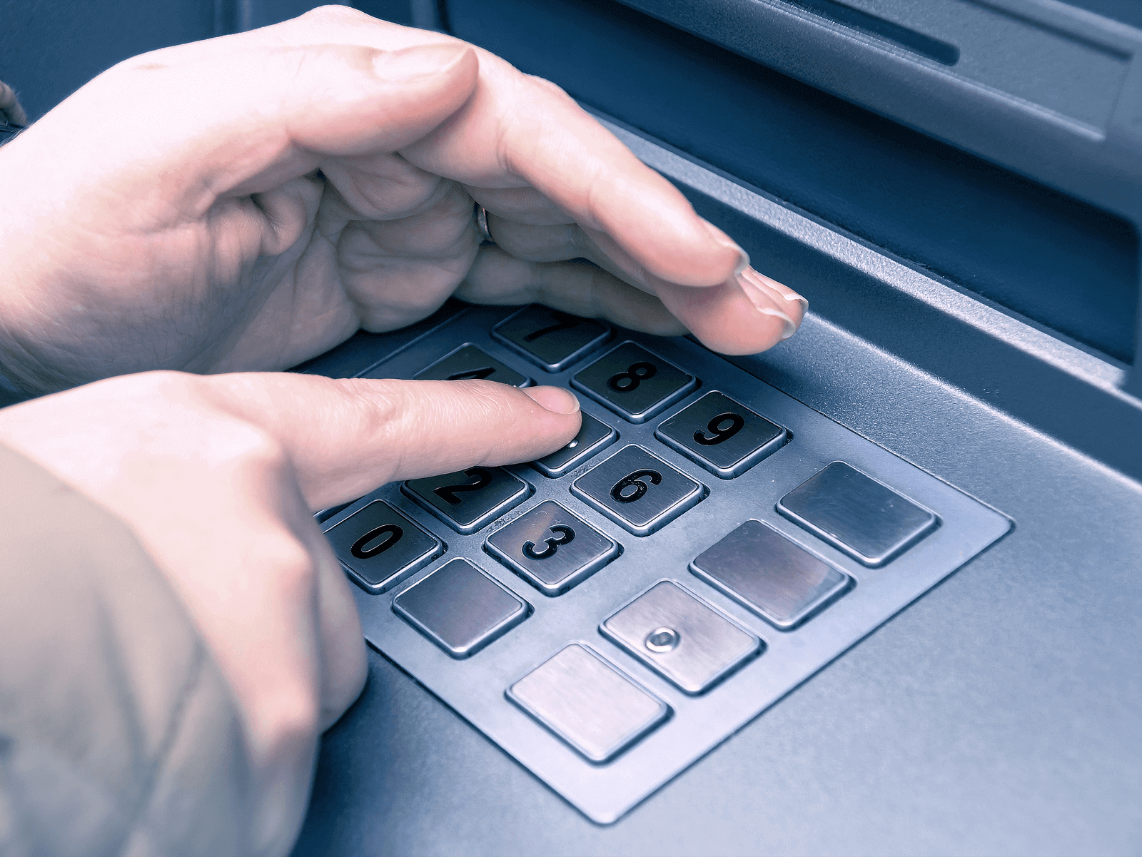 While entering your PIN code, cover the keyboard with your other hand